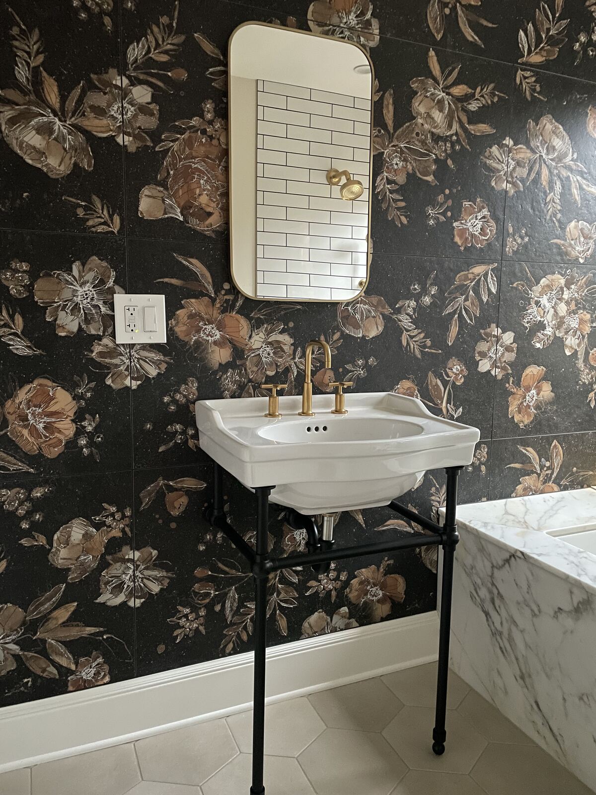 Bathroom vanity with floral wallpaper